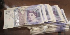 تأثیر غرامت خزانه‌داری انگلیس بر نمادهای بانکی